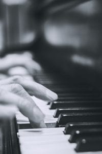 fingers on piano